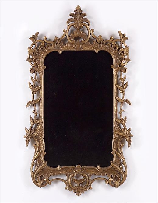 A Baroque Style Mirror.: A Baroque Style Mirror. 47" x 27" x 1"