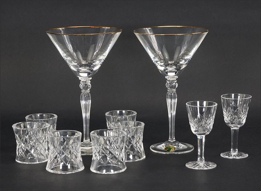 A Collection of Waterford Crystal.: A Collection of Waterford Crystal. Featuring a pair of Waterford Carleton Gold martini glasses, two Waterford Lismore liqueur glasses and six Waterford Comeragh napkin rings Martini glasses 7 1/4" tal