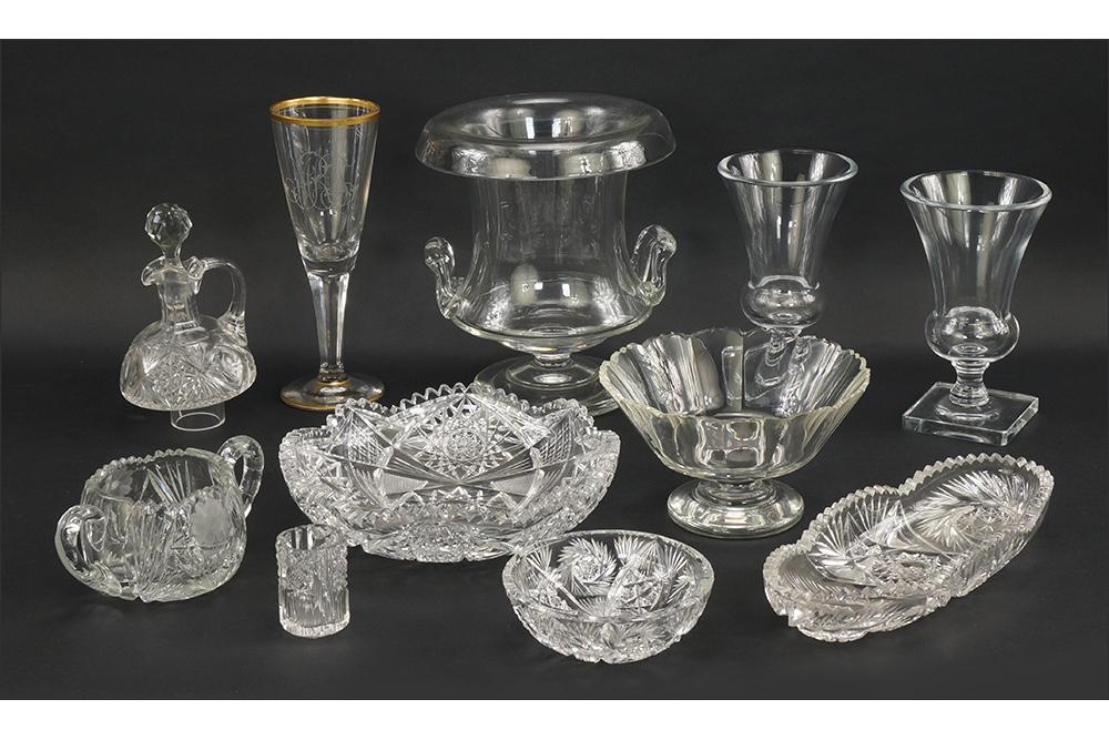 A Pair of Clear Glass Vases.: A Pair of Clear Glass Vases. Together with a clear glass champagne bucket, a faceted glass footed bowl, a faceted glass goblet and an assortment of brilliant cut glass table articles Vase height: 7 1/