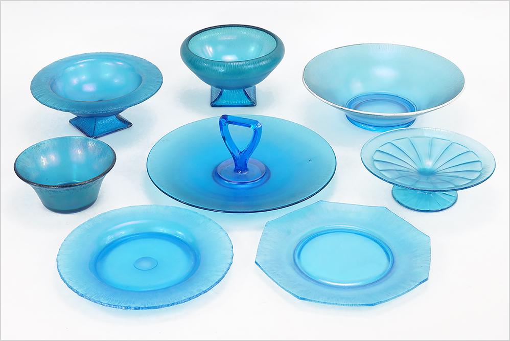 A Collection of Blue Fenton Stretch Glass.: A Collection of Blue Fenton Stretch Glass. Consisting of eight pieces of stretch glass, three compotes, two plates, two bowls and a tidbit tray Tidbit tray diameter: 11.75"