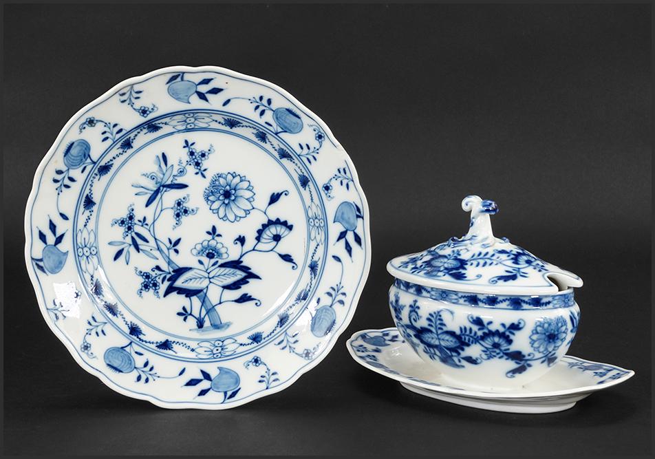 A Collection of Meissen Blue Onion Porcelain.: A Collection of Meissen Blue Onion Porcelain. Comprising four plates (second mark, diameter: 9 1/2"), one plate (first mark, diameter: 9 1/2") and one covered sauce boat with attached underplate (seco