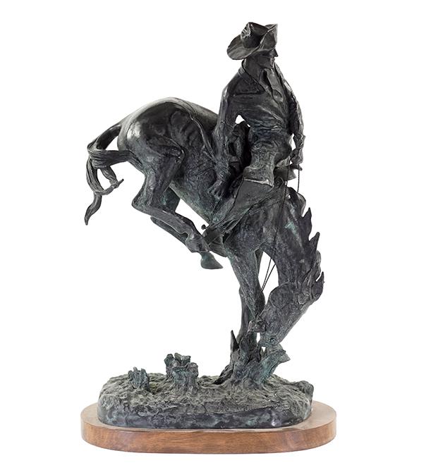 Cecil Golding After Frederic Remington (American,: Cecil Golding After Frederic Remington (American, 1861-1909) The Outlaw. Patinated bronze mounted to a wood base, signed within the foreground, dated 1979, and numbered 147/1000 Overall: 18 1/4" x 11 