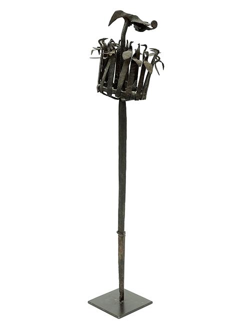 An African Yoruba Iron Ceremonial Staff.: MOTHER AND CHILD.Set in a metal display stand, Provenance: Les Primitifs Galerie, Chicago, 1989. Height: 24 1/2"