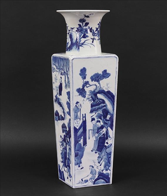 A Chinese Blue and White Porcelain Vase.: A Chinese Blue and White Porcelain Vase. Squared tapering sides, decorated with figures, and bearing an underglaze blue six-character Kangxi mark on the underside Height: 21 3/4"
