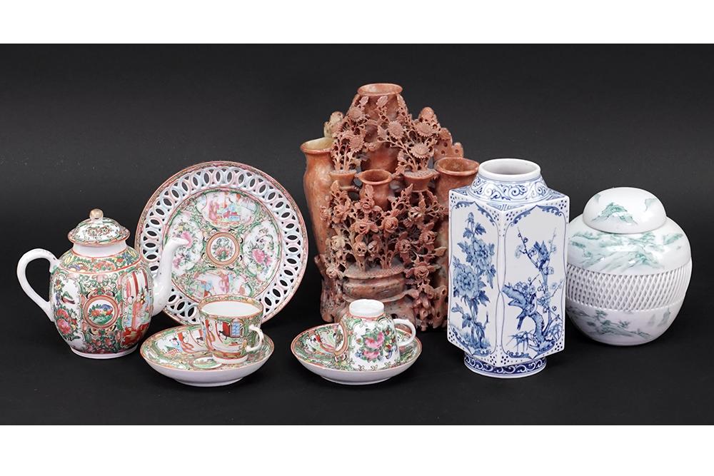 A Chinese Carved Soapstone Vase.: A Chinese Carved Soapstone Vase. Together with a Chinese blue and white porcelain vase, a Chinese porcelain covered jar, a Rose Medallion teapot, two teacups with saucers and a plate Blue and white va