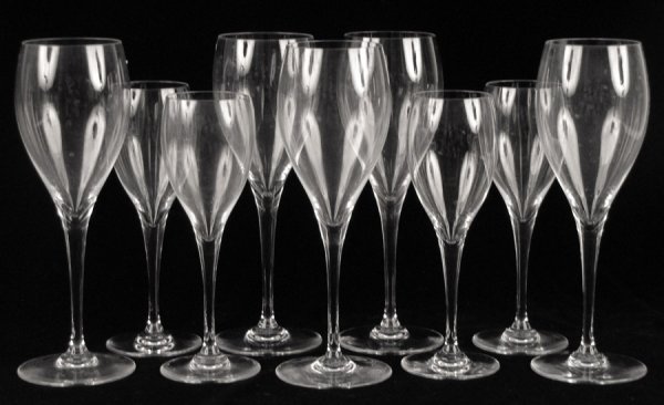 BACCARAT CRYSTAL STEMWARE IN THE ST. REMY PATTE: BACCARAT CRYSTAL STEMWARE IN THE ST. REMY PATTERN. Comprised of ten water goblets, and eleven wine goblets. With twelve Baccarat boxes