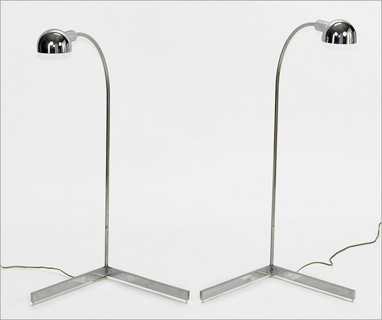A Pair of Chrome Adjustable Reading Lamps.: A Pair of Chrome Adjustable Reading Lamps. In the style of Casella, unmarked Height: 37"