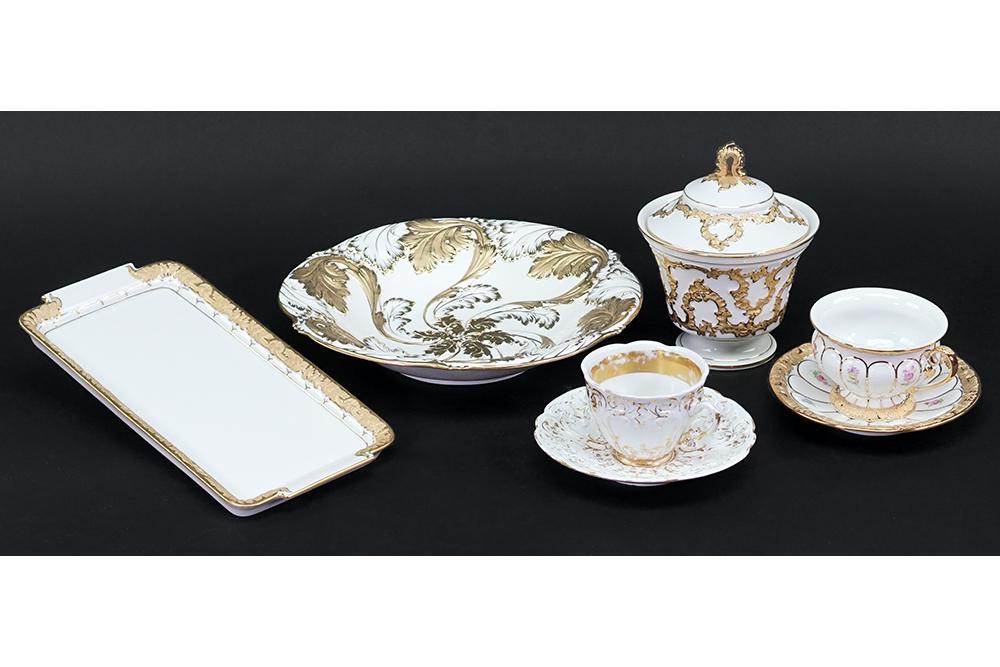 A Collection of Meissen Porcelain.: A Collection of Meissen Porcelain. Comprising two teacups with saucers, a round covered dish, a tray 5 3/4" x 11 1/4") and a round bowl (diameteR: 10 7/8"). All pieces bear a "first" Meissen mark with