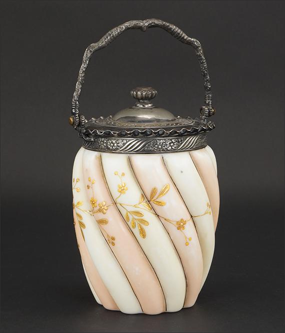 Pairpoint Mt. Washington Biscuit Jar.: Pairpoint Mt. Washington Biscuit Jar. Featuring a curved ribbed Mt. Washington biscuit with gold enamel decorations in a Pairpoint frame and lid 10" x 5"