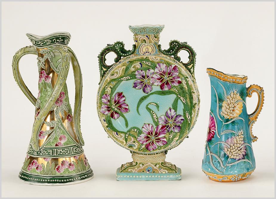 Three Nippon Moriage Floral Vases and Pitcher.: Three Nippon Moriage Floral Vases and Pitcher. Consisting of a Nippon Moriage double handle disc shaped vase, a three twist handle vase and a small pitcher Three Handle Vase: 10"