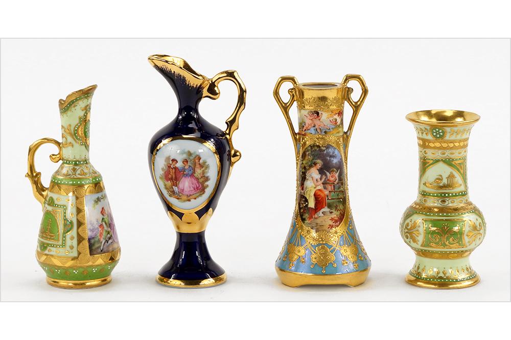 A Group of Four Hand Painted Cabinet Vases.: A Group of Four Hand Painted Cabinet Vases. Consisting of two gold and green gilt German vases. Together with a Limoges cobalt and gold gilt ewer and a gold gilt and teal blue two handle vase Height: