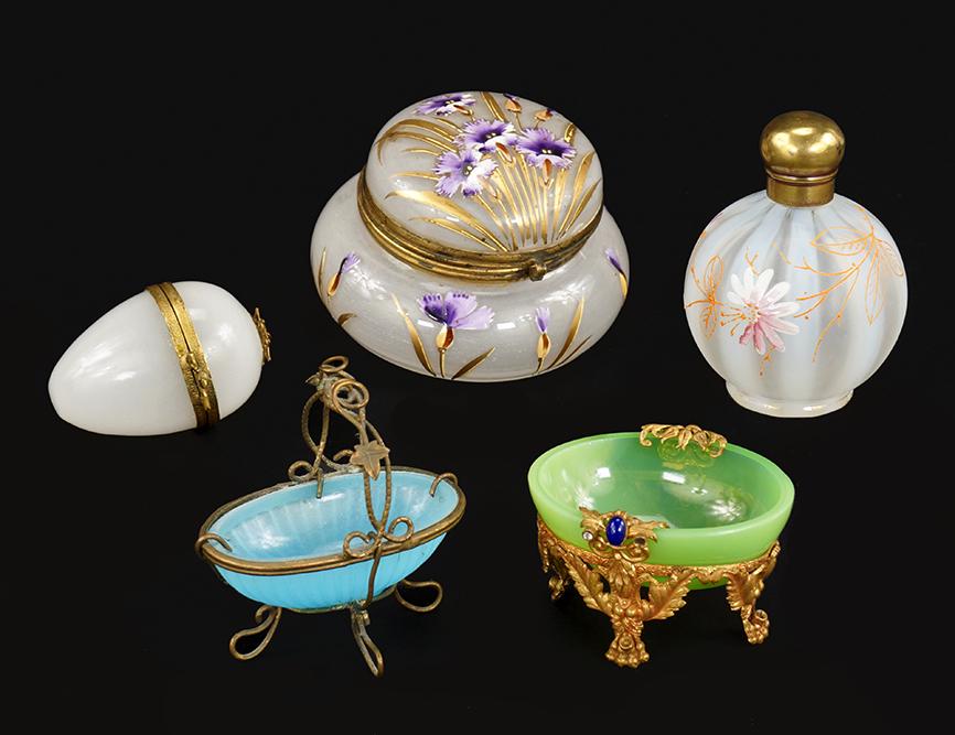 Victorian Enamel Art Glass Dresser Items.: Victorian Enamel Art Glass Dresser Items. Consisting of an opaque and floral enamel decorated powder box, a striped opalescent and enamel decorated perfume bottle, two egg shaped dresser trays and an 