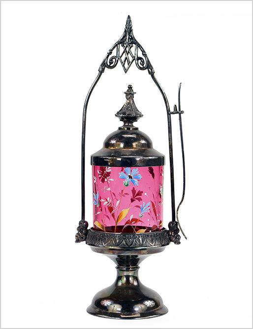 Victorian Cranberry and Enameled Pickle Caster.: Victorian Cranberry and Enameled Pickle Caster. Featuring a silver plate frame and cranberry enameled pickle caster Height: 13 1/2"
