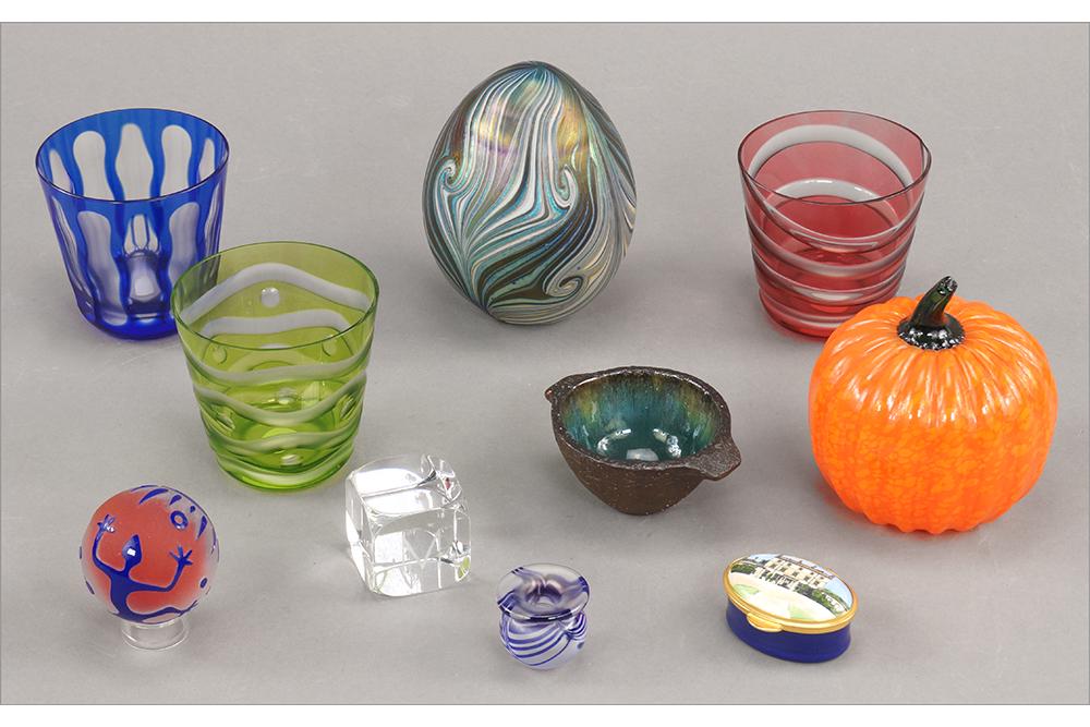 A Collection of Decorative Items.: A Collection of Decorative Items. Comprising a Baccarat clear cube engraved "M" on one side (1 1/2" x 1 1/2" x 1 1/2"), a Larson glass pumpkin, a Vandermark egg form paperweight, a Stacey glass cabine