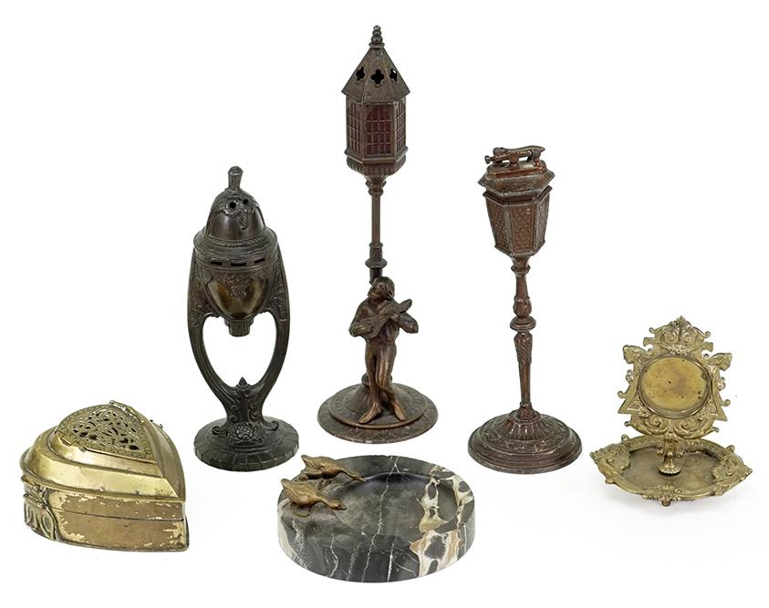 A Collection of Brass Table Articles.: A Collection of Brass Table Articles. Consisting of two pedestal incense burners, a pedestal lighter, a brass heart shaped incense burner, a marble base tray and a brass pocket watch holder Pedestal I