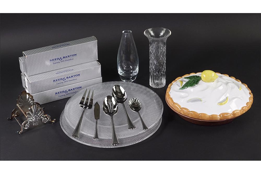 A Collection of Decorative Items.: A Collection of Decorative Items. Comprising a Cartier crystal vase, a clear glass vase, a Portuguese majolica lemon meringue pie server, a silverplate knife rack, two round glass chargers and eight f