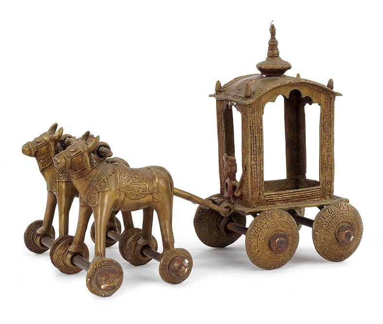 An Indian Brass Temple Toy.: An Indian Brass Temple Toy. Depicting a carriage being pulled by two animals 11 1/4" x 14" x 9 1/2"