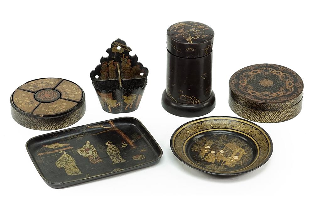 A Collection of Lacquered Papier Mache.: A Collection of Lacquered Papier Mache. Comprising a wall mount match safe, a covered canister, a rectangular tray, a round dish and a stacking box with compartment boxes on the interior Canister heig