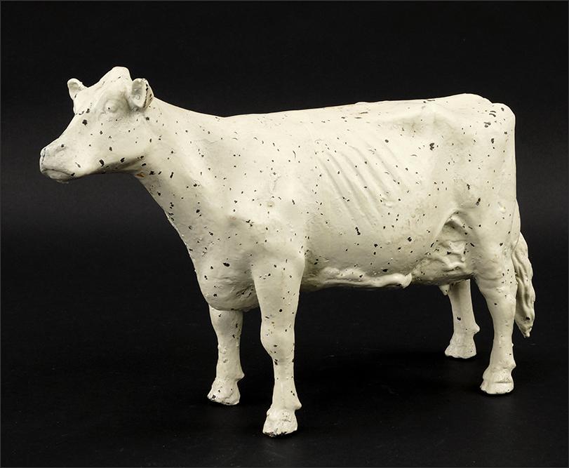 Cast Iron Cow Doorstop.: Cast Iron Cow Doorstop. Featuring a painted cast iron cow doorstop 10" x 15" x 5"