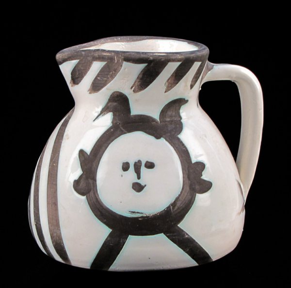 PABLO PICASSO (1881-1973) CERAMIC PITCHER OF TW: PABLO PICASSO (1881-1973) CERAMIC PITCHER OF TWO FACES. Marked and stamped "Edition Picasso" H: 5.25" W: 6.25" D: 5.5"
