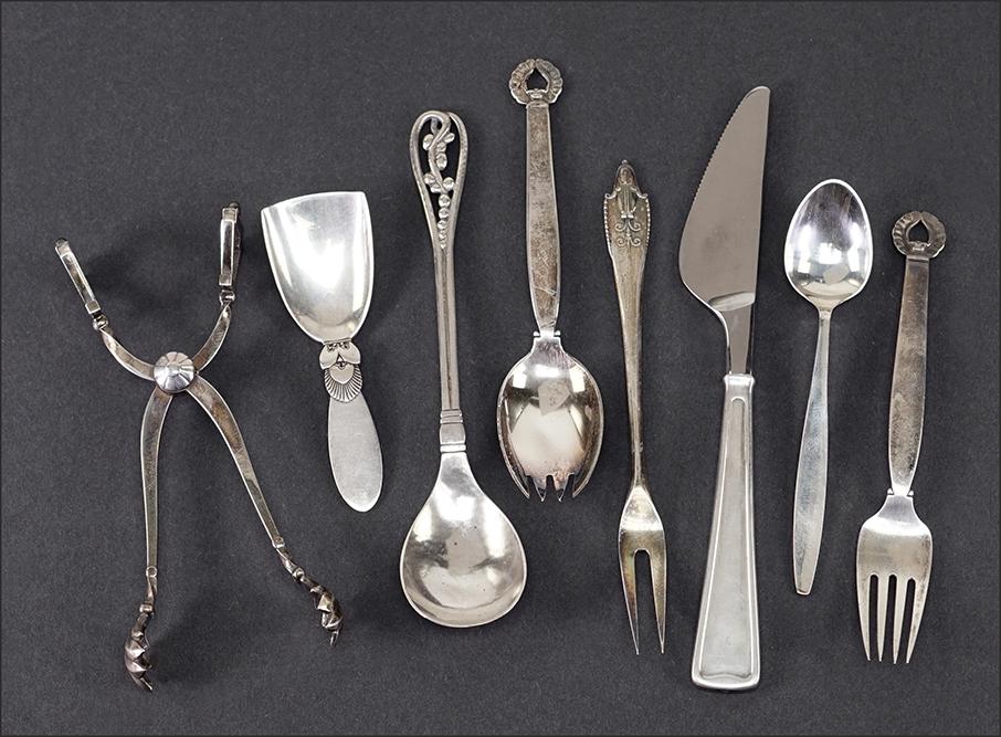 A Collection of Georg Jensen Sterling Silver Utensils. (1 of 1)