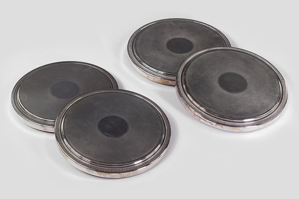 Four Christofle Silverplate Trivets.: Four Christofle Silverplate Trivets. Malmaison pattern 1" x 9 1/2"