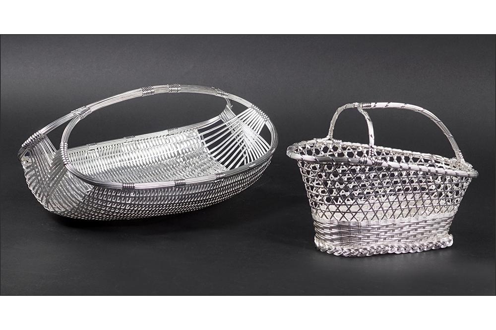 Two Christofle Baskets.: Two Christofle Baskets. Woven silverplate wine carrier basket and an oval woven silverplate basket (6" x 15" x 9 1/4") Wine carrier: 7 1/2" x 10" x 5"