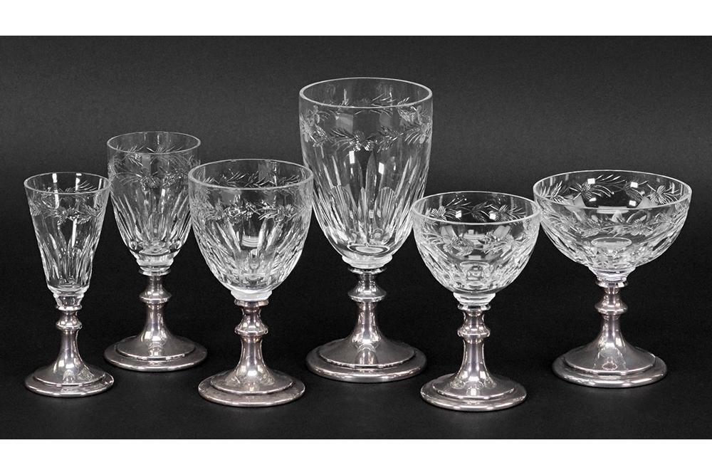 A Hawkes Sterling Silver and Etched Crystal Partial: A Hawkes Sterling Silver and Etched Crystal Partial Stemware Service. S7330 pattern comprising seven water goblets, six claret wine goblets (5 1/4"), three champagne / sherbet goblets, twelve liquor/c