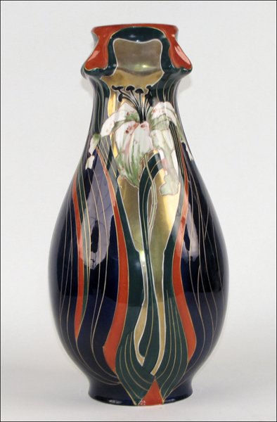 CARL KNOLL KARLSBADER GILT PORCELAIN VASE DECORATED WIT: CARL KNOLL KARLSBADER GILT PORCELAIN VASE DECORATED WITH A LILY. Austria Height: 19.25"