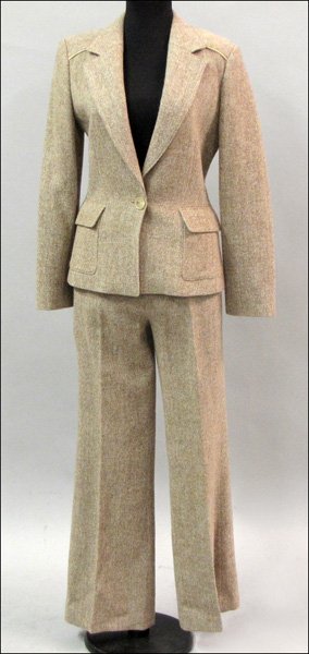 LUCA LUCA WOOL HERRINGBONE PANT SUIT.: LUCA LUCA WOOL HERRINGBONE PANT SUIT. Jacket has a rear belt and is piped in beige leather. Jacket and pants are both fully silk lined Jacket and skirt: Size 42
