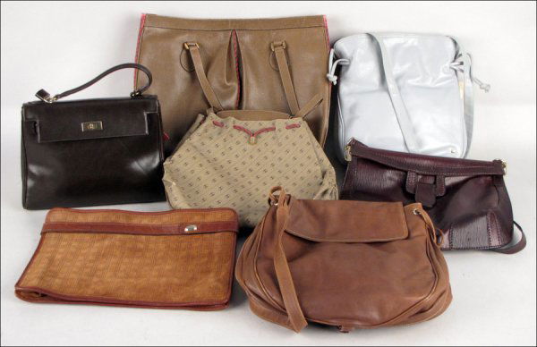 GUCCI MONOGRAMMED CANVAS AND LEATHER HANDBAG.: GUCCI MONOGRAMMED CANVAS AND LEATHER HANDBAG. Together with a Gucci brown leather handbag, a Halston grey leather handbag, Morris Moskowitz brown leather handbag, a Joseph clutch, and others