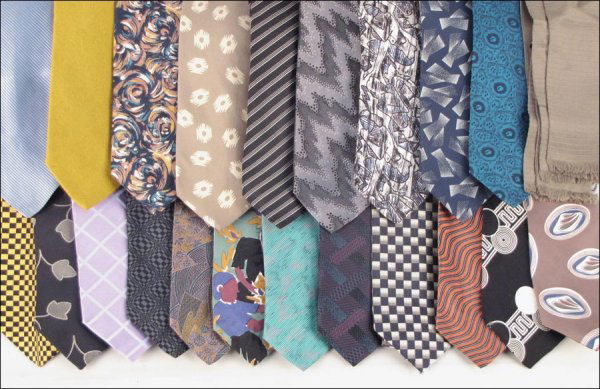 GROUP OF SILK AND WOOL TIES.: GROUP OF SILK AND WOOL TIES. With examples by Brioni, Andrew Tezza, and many others