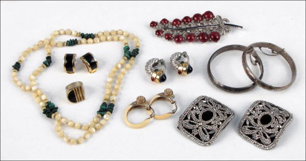 MAZER RHINESTONE, FAUX CABOCHON RUBY, AND FAUX: MAZER RHINESTONE, FAUX CABOCHON RUBY, AND FAUX SAPPHIRE FEATHER FORM BROOCH. Together with one pair of Ciner twisted rope clip earrings, one pair of Christian Dior clip earrings, one Mexican sterling