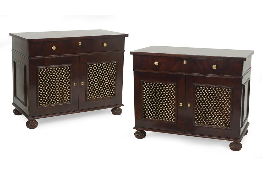 A Pair of Regency Style Cabinets.: A Pair of Regency Style Cabinets. Mahogany cabinets with a single drawer above a two-door compartment. Raised on bun feet 32 1/2" x 40" x 20"