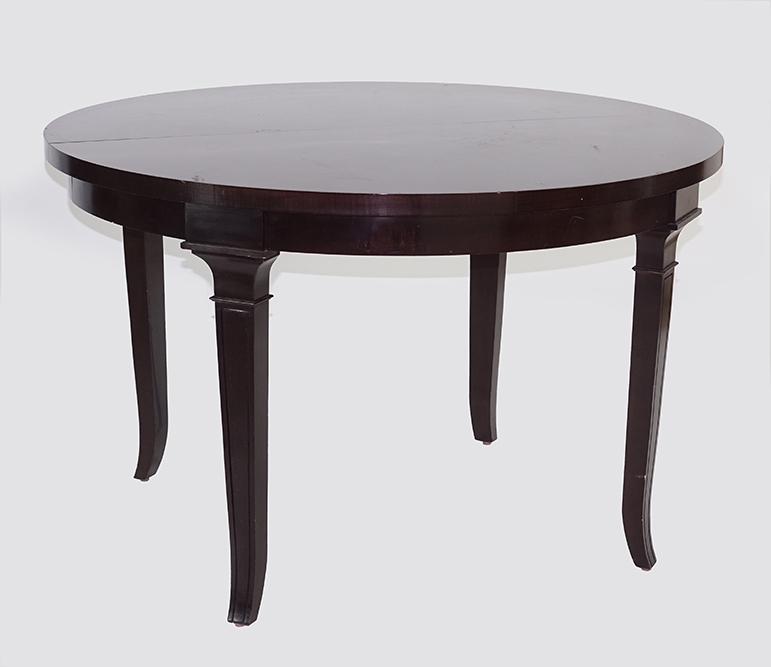 A Ralph Lauren for Henredon Clivedon Dining Table.: A Ralph Lauren for Henredon Clivedon Dining Table. Round macassar veneer dining table raised on saber legs. With one 22" extension leaf Table: 30" x 42"
