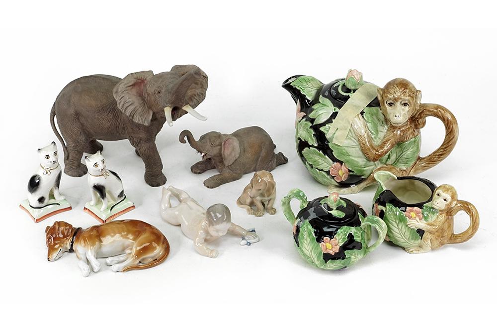 A Fitz and Floyd Monkey Tea Service.: A Fitz and Floyd Monkey Tea Service. Comprising a teapot, creamer and covered sugar bowl. Together with a Royal Copenhagen baby 1739, a Bing & Grondahl porcelain dog, a Pfeffer porcelain dog, a pair o