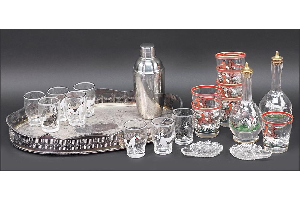 A Collection of Barware.: A Collection of Barware. Comprising a set of eight painted glasses with various dogs, a set of seven hunt themed old fashioned glasses, a pair of hunt themed painted faceted glass bottles, a cocktail 