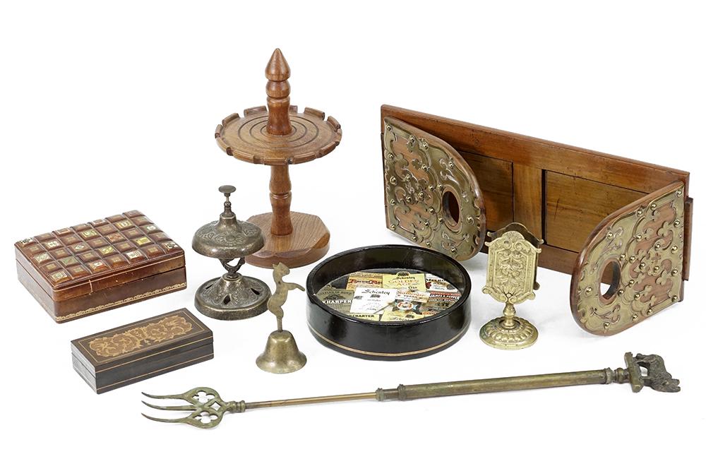 A Collection of Decorative Items.: A Collection of Decorative Items. Comprising leather card box, an inlaid wood stamp box, a leather coaster, a wood and brass bookend, a wood spoon stand, a French brass match box holder, a brass desk