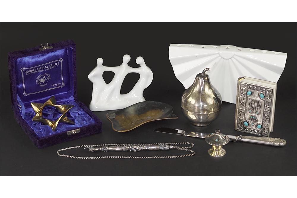 A Collection of Judaica.: A Collection of Judaica. Comprising a silverplate torah pointer, a silverplate pear form box, a silverplate covered dish, a sterling silver handled bread knife, a Pal Bell bronze dish (1 x 6 3/4" x 4 