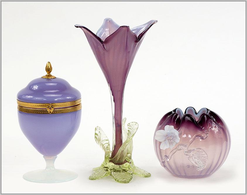 Victorian Amethyst Opaque Glass Decorative Items.: Victorian Amethyst Opaque Glass Decorative Items. Consisting of an applied decoration cased glass amethyst glass rose bowl, a vaseline glass base tulip form vase and an amethyst glass opaline compote