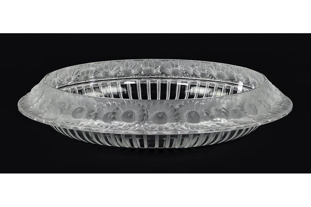 A Lalique Marguerite Bowl.: A Lalique Marguerite Bowl. Clear and frosted glass bowl with daisy blossoms forming the perimeter. Signed Lalique, France on the underside 2 3/4" x 13 1/2"