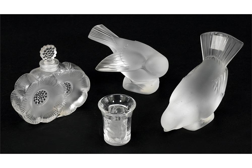 A Collection of Lalique Glass.: A Collection of Lalique Glass. Comprising two sparrows, one Deux Fleurs perfume bottle and an Enfants shot glass Perfume bottle: 3 1/2" x 3 3/4" x 1"
