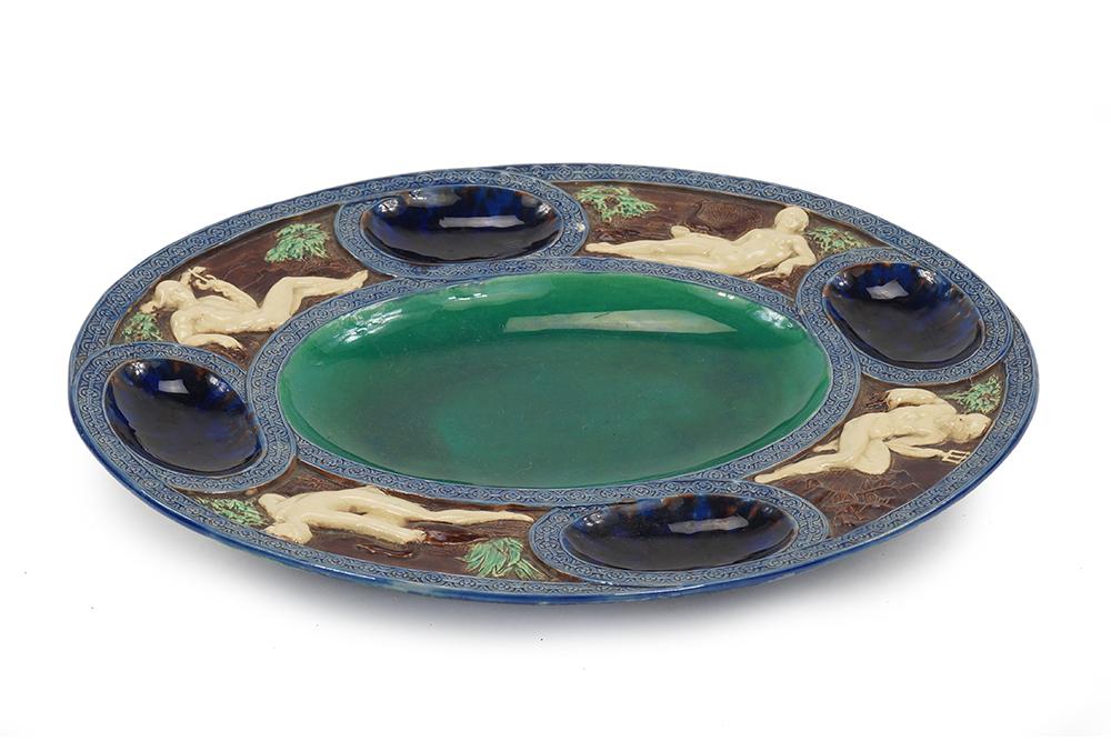 A Victorian Engish Majolica Platter.: A Victorian Engish Majolica Platter. Polychrome decorated platter depicting mythological figures of Mercury, Leda, Neptune and Juno with wells between. Not marked, likely Minton 1 3/4" x 14 3/4" x 12 
