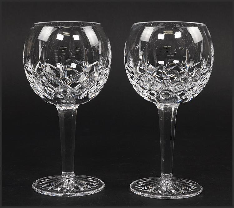 A Set of Twelve Waterford Crystal Hock Wine Glasses in: A Set of Twelve Waterford Crystal Hock Wine Glasses in the Lismore Pattern. 7 1/8"