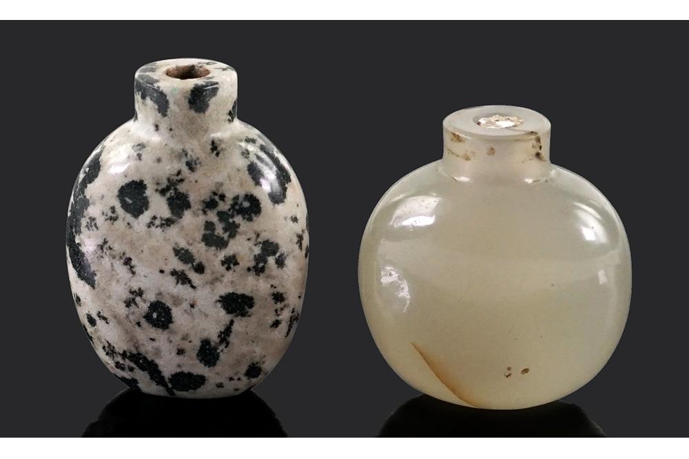 A Chinese Carved Jade Snuff Bottle.: A Chinese Carved Jade Snuff Bottle. Together with a Chinese carved jasper snuff bottle Jade: 1 7/8" x 1 5/8" x 1"