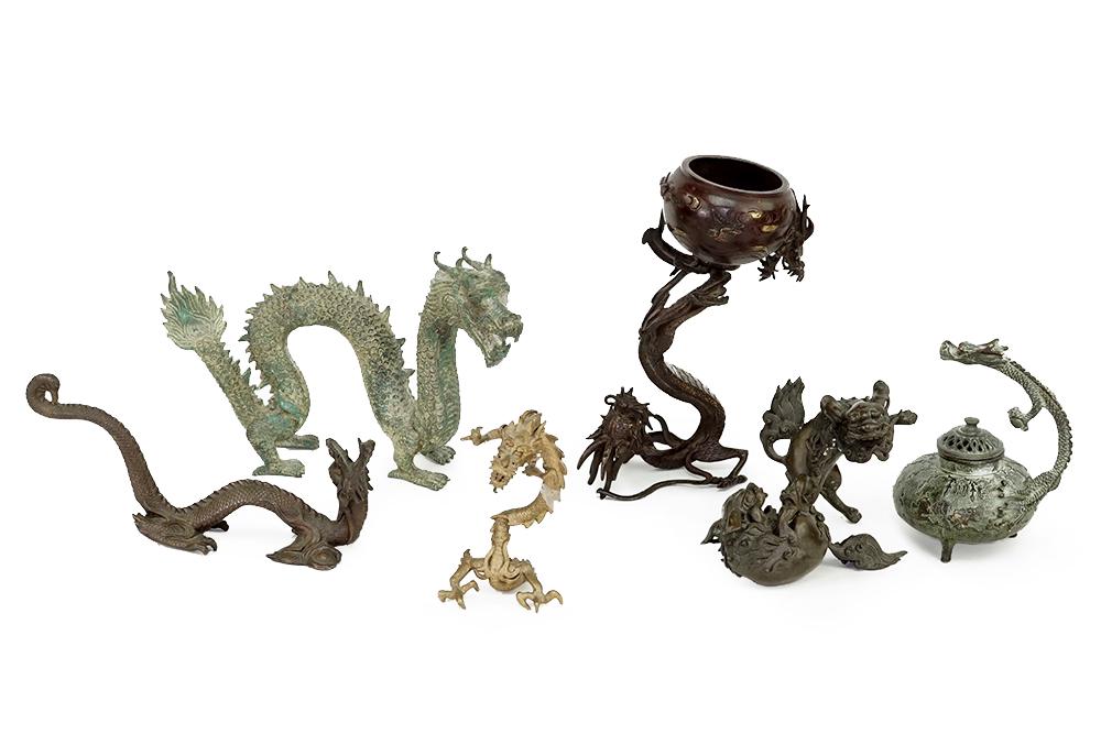 A Collection of Bronze and Patinated Metal Dragon: A Collection of Bronze and Patinated Metal Dragon Figures. Consisting of four dragon figures, a figure of fighting foo lions and a figural dragon incense Tallest Dragon: 9"