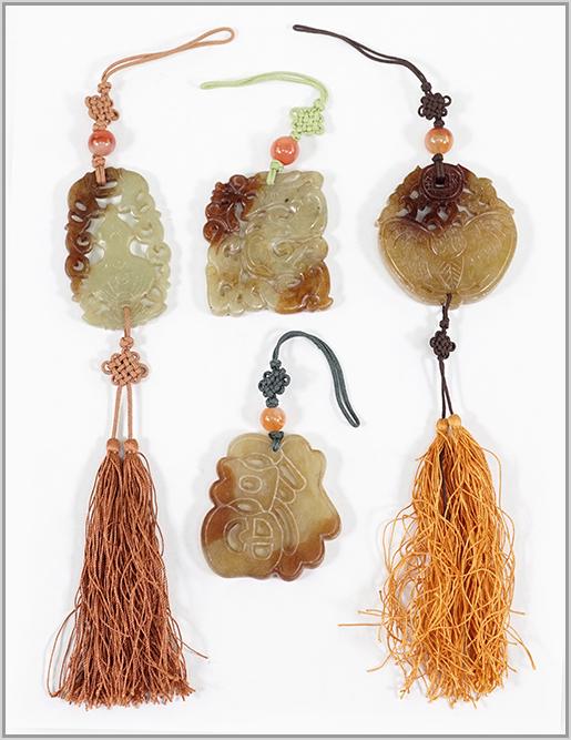 Four Carved Soapstone Plaques.: Four Carved Soapstone Plaques. Depicting a double gourd vase, a moth, a dragon and another. All four are mounted with agate beads Largest: 2 1/2" x 1 1/2"