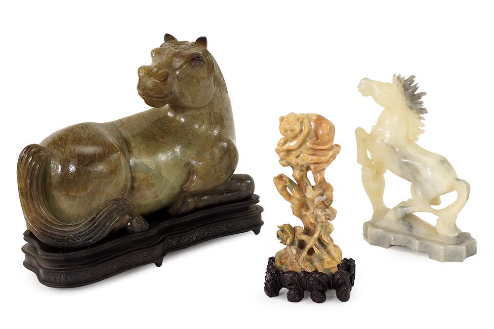 Three Chinese Carved Stone Figures.: Three Chinese Carved Stone Figures. Including a hardstone horse, a soapstone horse, and a hardstone cat in a tree, the larger horse and the cat with fitted wood stands Larger horse: 7" x 10" x 4 1/4"
