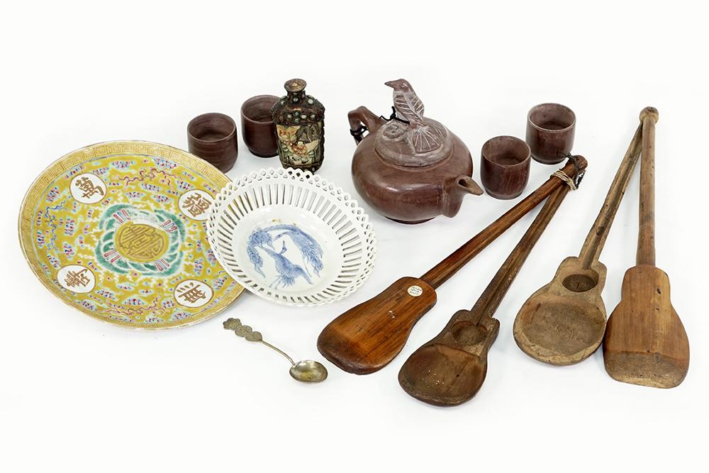 A Collection of Asian Decorative Items.: A Collection of Asian Decorative Items. Including a ceramic teapot and four cups, two wood opium scale holders, a composite snuff bottle with metal overlay, a commemorative spoon, a yellow ground porc