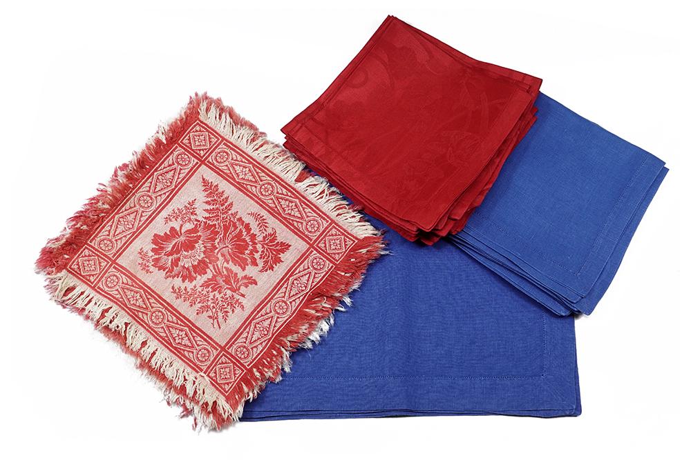 A Set of Twelve Le Jacquard Francais Tivoli Cherry: A Set of Twelve Le Jacquard Francais Tivoli Cherry Napkins. Together with a set of twelve red and white cotton napkins and a set of eight blue linen napkins with a set of eight coordinating blue linen